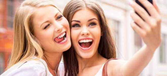 Что лучше коронки или виниры